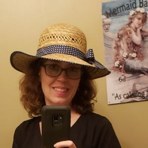 Straw sunhat with polka dot ribbon